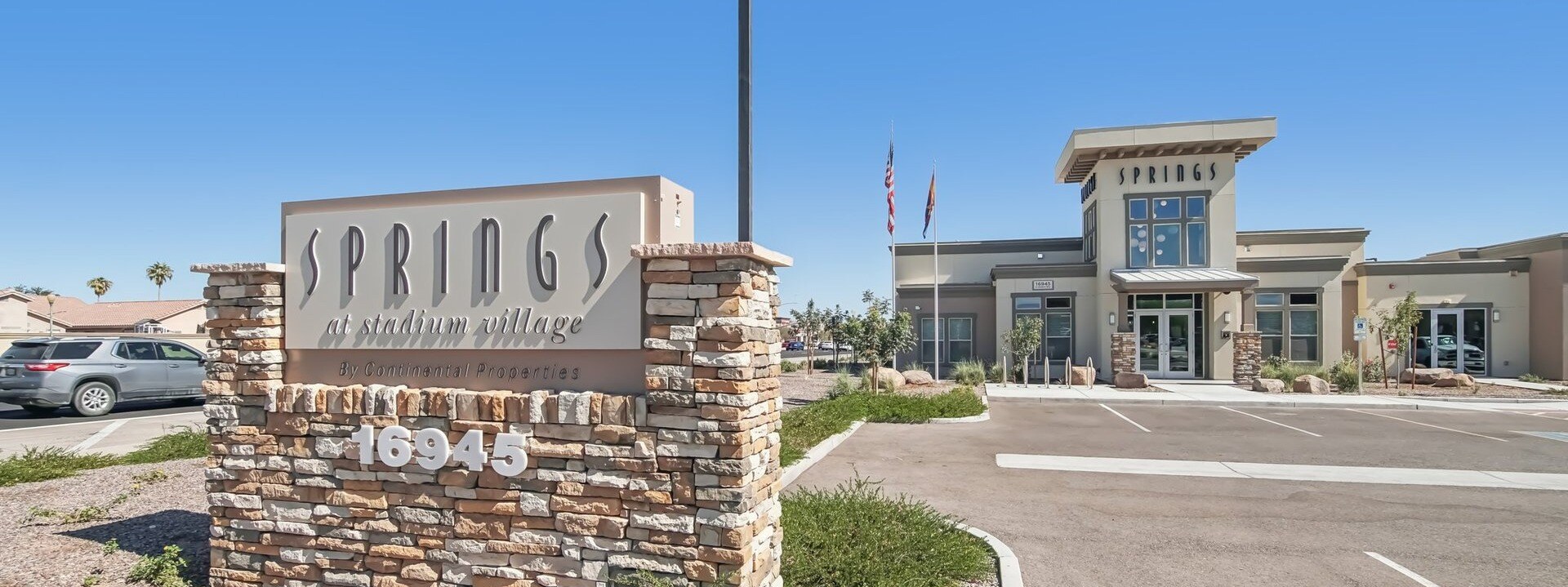 Stadium Village Sign and Clubhouse Exterior